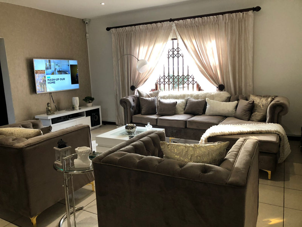 L shaped Chesterfield + 2 chairs